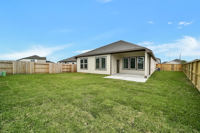 2563 Newport Breeze Dr, Katy, TX 77493 - back of house with a patio area, central AC unit, and roof with shingles