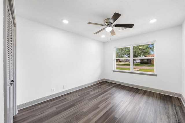 702 Pennington St, Houston, TX 77022 - unfurnished room featuring recessed lighting, baseboards, a ceiling fan, and dark wood-style floors