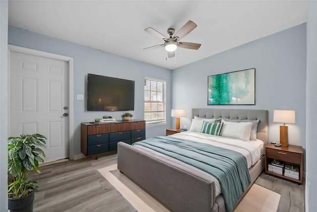723 Frost Ave, Anahuac, TX 77514 - bedroom with light wood-style flooring and a ceiling fan