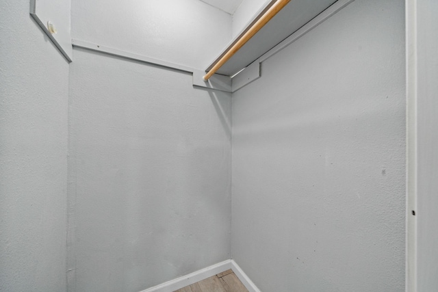 723 Frost Ave, Anahuac, TX 77514 - spacious closet featuring light wood-type flooring
