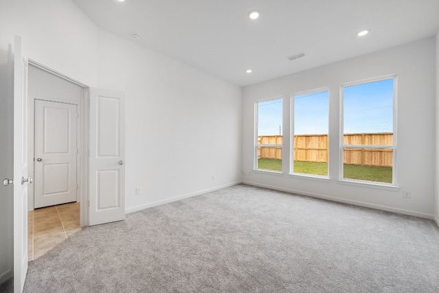 21818 Wycombe Terrace Way, Cypress, TX 77433 - empty room featuring carpet floors, recessed lighting, and baseboards
