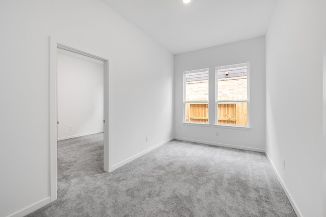21818 Wycombe Terrace Way, Cypress, TX 77433 - unfurnished room featuring carpet and baseboards