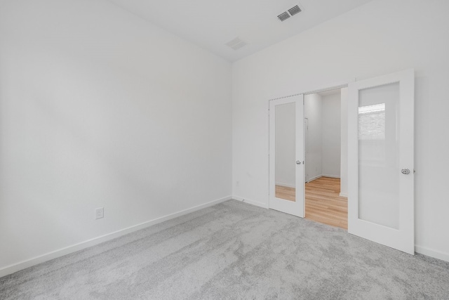 21818 Wycombe Terrace Way, Cypress, TX 77433 - unfurnished bedroom featuring french doors, carpet floors, and baseboards