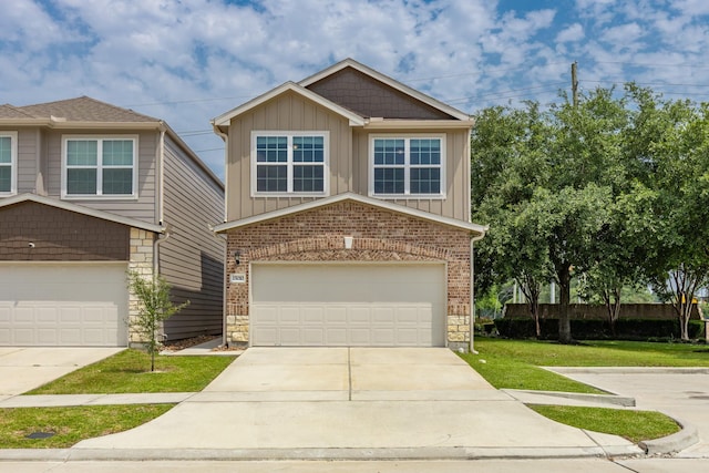 15010 Eagle Feather Ct, Houston, TX 77090 - craftsman-style home with board and batten siding, a front lawn, driveway, and a garage