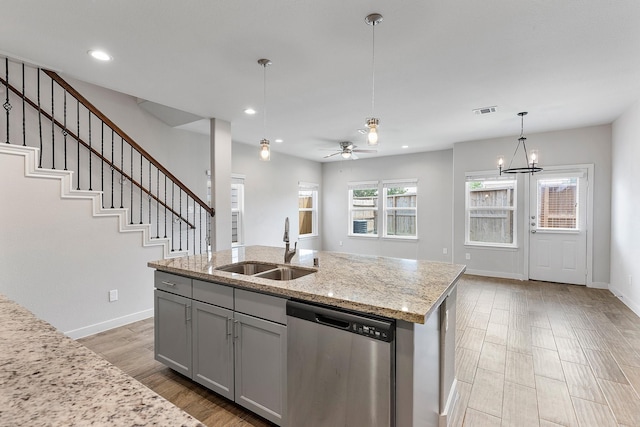 15010 Eagle Feather Ct, Houston, TX 77090 - kitchen featuring a sink, visible vents, dishwasher, gray cabinetry, and recessed lighting
