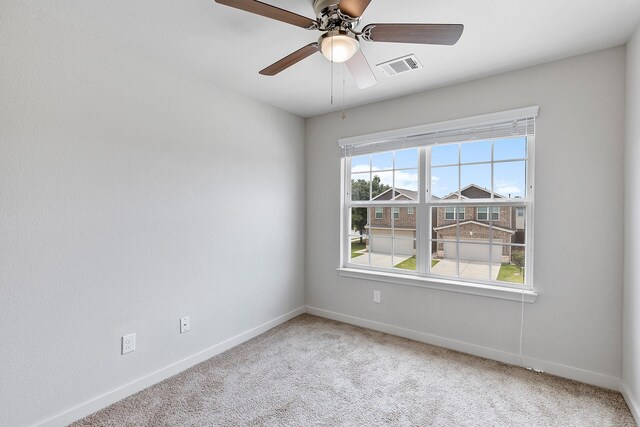 15010 Eagle Feather Ct, Houston, TX 77090 - spare room featuring carpet flooring, baseboards, a ceiling fan, and visible vents