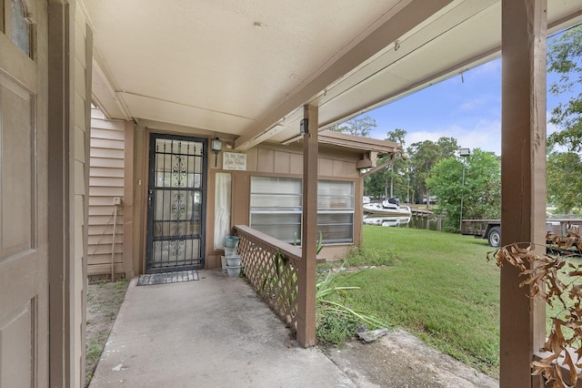 155 Cedar Pne, Livingston, TX 77351 - entrance to property with a yard and a water view
