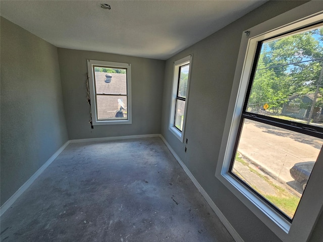3229 Holman St Unit 4, Houston, TX 77004 - unfurnished room with concrete floors and baseboards
