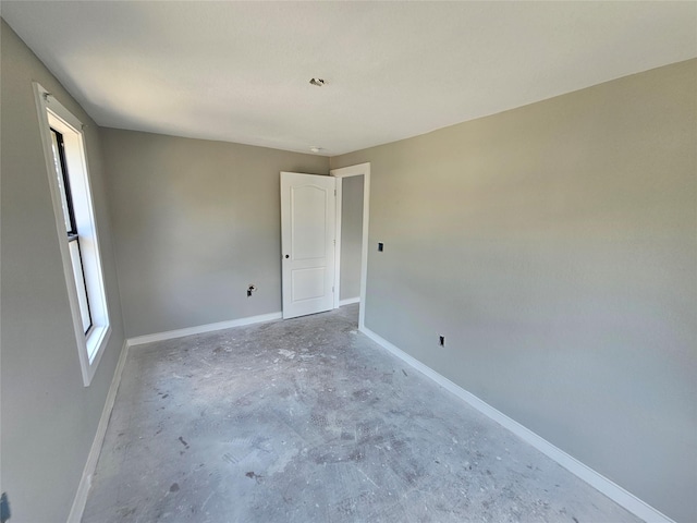 3229 Holman St Unit 4, Houston, TX 77004 - spare room featuring concrete floors and baseboards