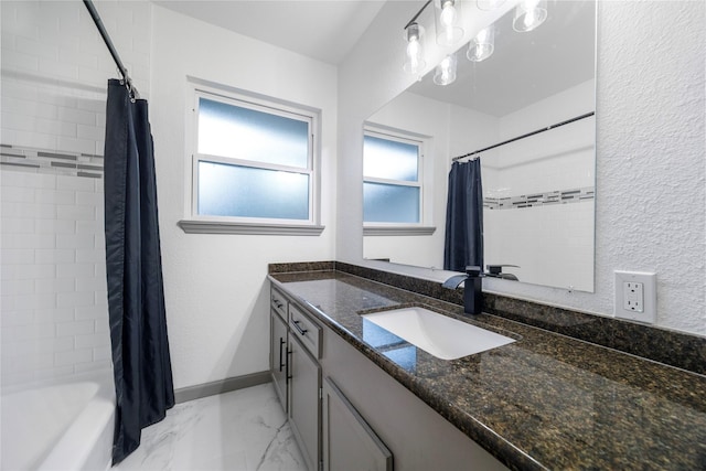 9211 Helmers St, Houston, TX 77022 - bathroom with vanity, shower / tub combo with curtain, and marble finish floor