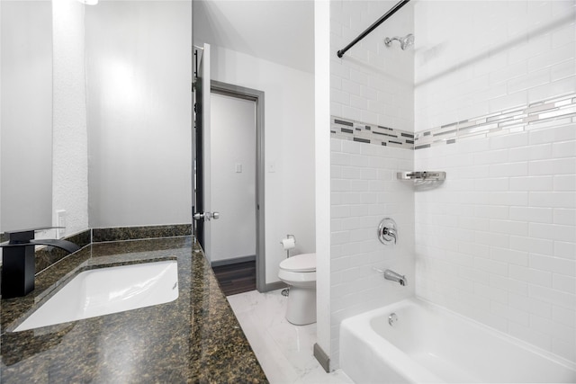 9211 Helmers St, Houston, TX 77022 - full bathroom with toilet, vanity, and shower / bathing tub combination