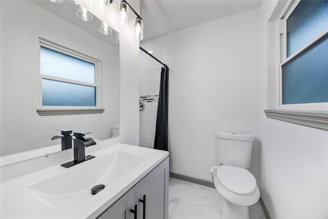 9211 Helmers St, Houston, TX 77022 - bathroom featuring toilet, curtained shower, marble finish floor, and vanity