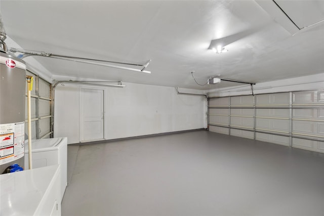 9211 Helmers St, Houston, TX 77022 - garage featuring washer / dryer and a garage door opener