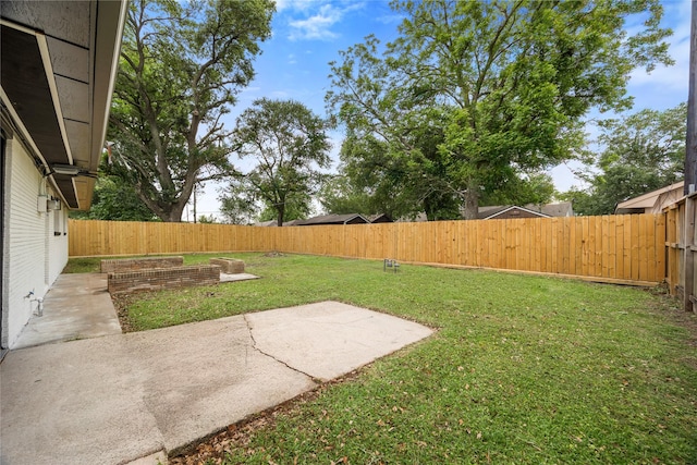9211 Helmers St, Houston, TX 77022 - view of yard with a patio area and a fenced backyard