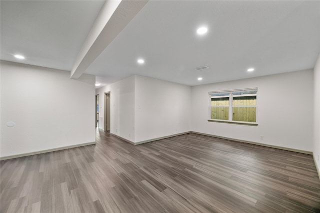 9211 Helmers St, Houston, TX 77022 - basement with recessed lighting, baseboards, and wood finished floors