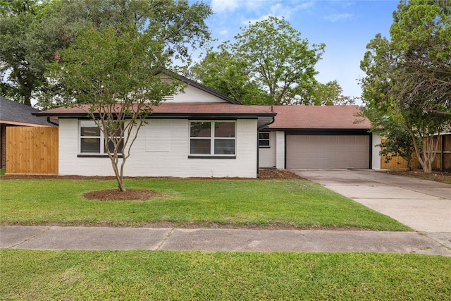 9211 Helmers St, Houston, TX 77022 - single story home featuring fence, a garage, a front lawn, and concrete driveway