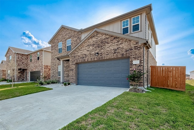5811 Capri Forest Dr, Katy, TX 77493 - traditional-style home with driveway, board and batten siding, a front yard, and brick siding