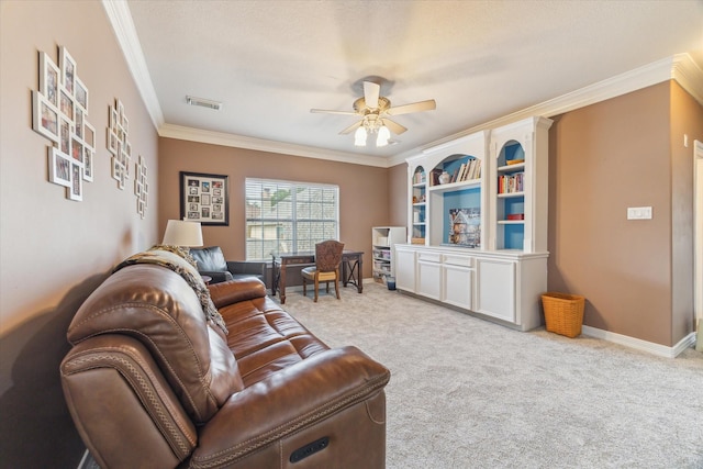 living area featuring carpet, ornamental molding, a ceiling fan, built in features, and baseboards