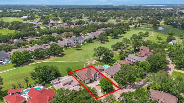 aerial view of residential area featuring a golf course and property boundaries highlighted