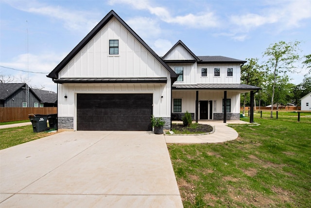 24585 Tipperary St, Hempstead, TX 77445 - modern farmhouse style home with covered porch, board and batten siding, driveway, and a standing seam roof