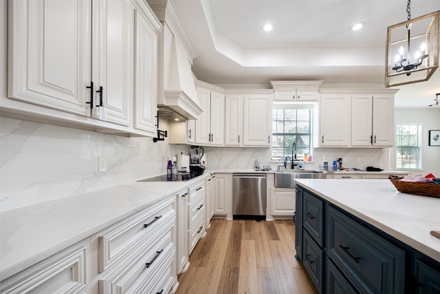 24585 Tipperary St, Hempstead, TX 77445 - kitchen with a sink, black electric stovetop, dishwasher, white cabinetry, and custom range hood
