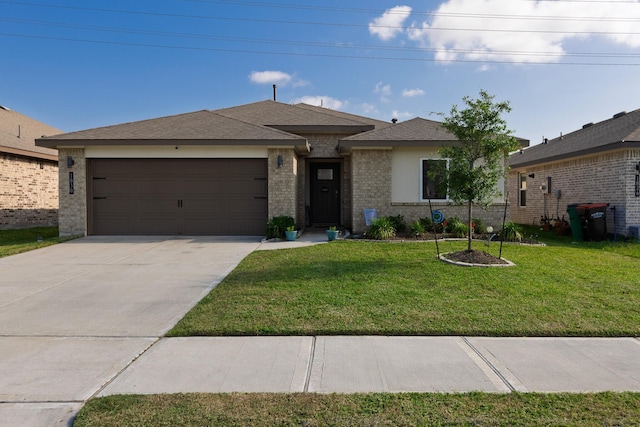 1830 William Scott St, Baytown, TX 77523 - view of front facade featuring a front yard, brick siding, driveway, and a garage
