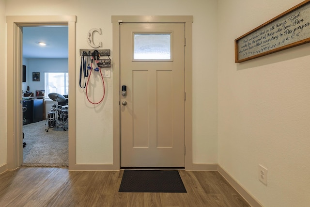 1830 William Scott St, Baytown, TX 77523 - entrance foyer with baseboards and wood finished floors