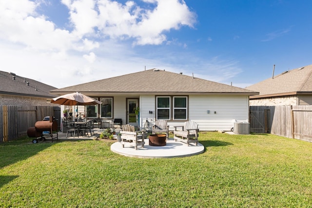 1830 William Scott St, Baytown, TX 77523 - rear view of property featuring a yard, a patio, and a fenced backyard