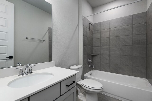 17828 Hanson Ridge Dr, Conroe, TX 77316 - bathroom with toilet, washtub / shower combination, and vanity