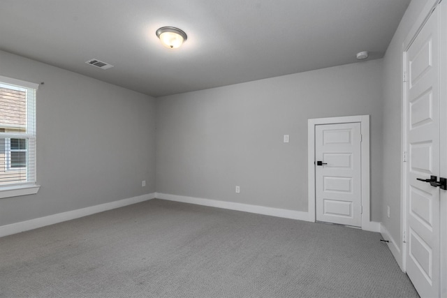 17828 Hanson Ridge Dr, Conroe, TX 77316 - carpeted spare room featuring baseboards
