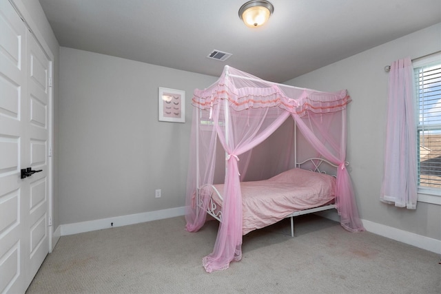 17828 Hanson Ridge Dr, Conroe, TX 77316 - carpeted bedroom featuring baseboards
