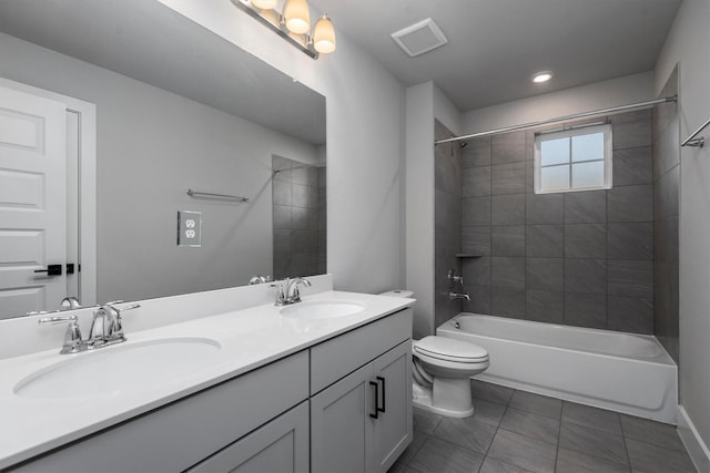 17828 Hanson Ridge Dr, Conroe, TX 77316 - full bathroom with toilet, double vanity, shower / tub combination, tile patterned floors, and recessed lighting