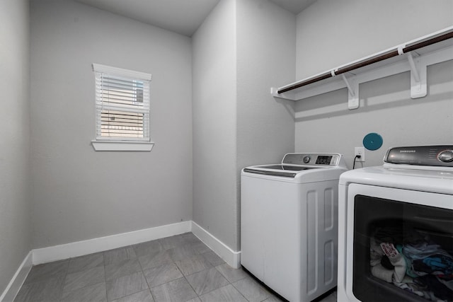17828 Hanson Ridge Dr, Conroe, TX 77316 - laundry area with independent washer and dryer and baseboards