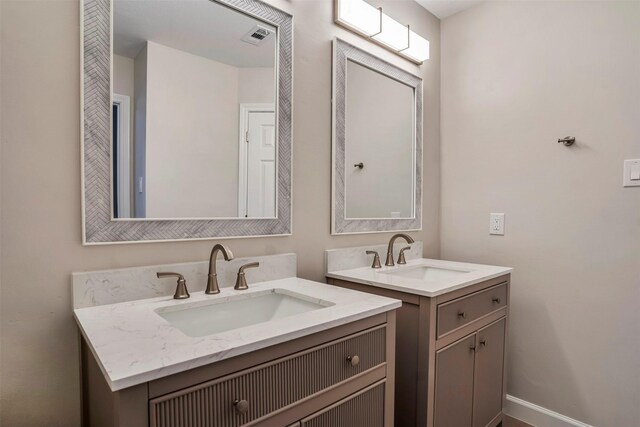 17422 Marigold Dr, Sugar Land, TX 77479 - bathroom featuring two vanities