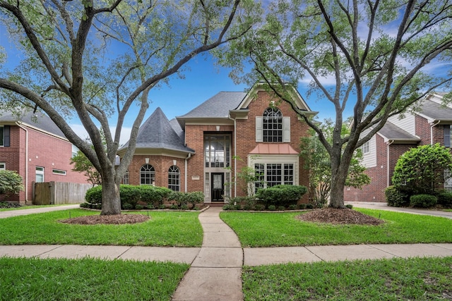 17422 Marigold Dr, Sugar Land, TX 77479 - traditional-style house featuring brick siding