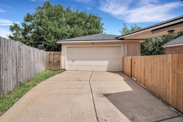 17422 Marigold Dr, Sugar Land, TX 77479 - garage featuring fence and concrete driveway