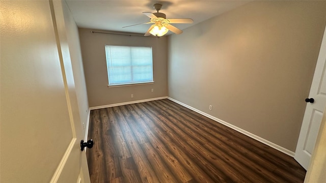 407 Bendwood Dr Unit 38, Houston, TX 77024 - spare room with a ceiling fan, baseboards, and dark wood finished floors