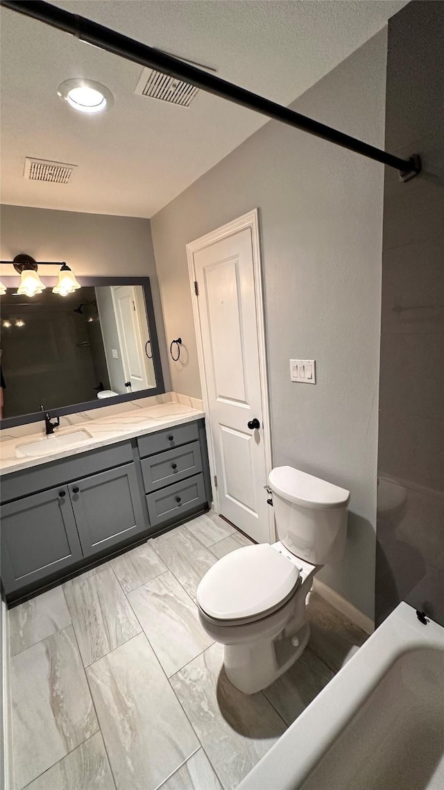 407 Bendwood Dr Unit 38, Houston, TX 77024 - full bathroom with toilet, vanity, visible vents, and a bath