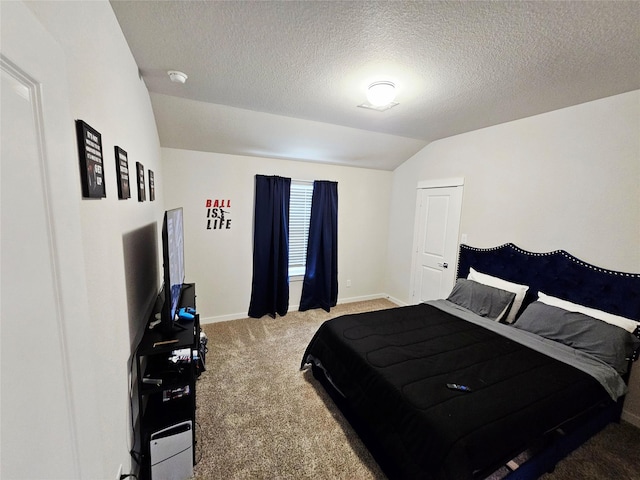 carpeted bedroom with vaulted ceiling, a textured ceiling, and baseboards