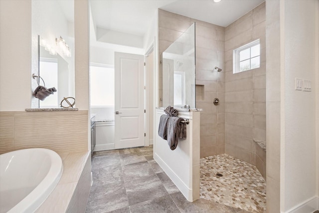 3419 Campestres, Spring Branch, TX 78070 - full bathroom featuring walk in shower, a garden tub, and baseboards