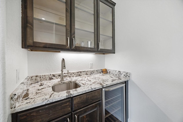 3419 Campestres, Spring Branch, TX 78070 - bar featuring wet bar, a sink, beverage cooler, and a textured wall