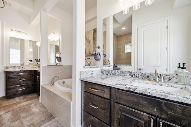 3419 Campestres, Spring Branch, TX 78070 - bathroom featuring a garden tub, vanity, and visible vents