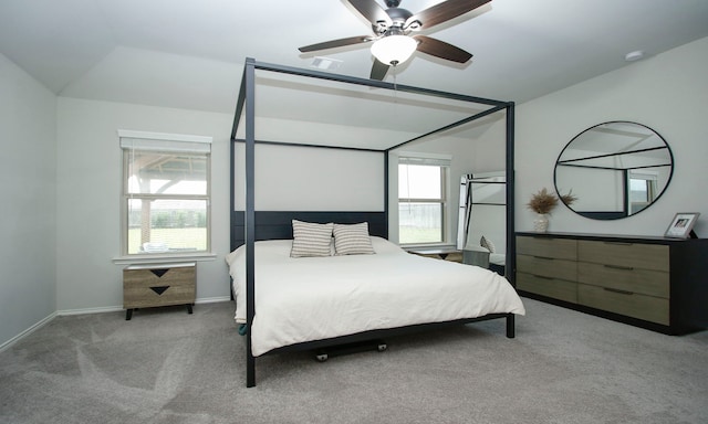 18715 Callalily Bloom Ct, Tomball, TX 77377 - carpeted bedroom with baseboards, ceiling fan, lofted ceiling, and visible vents