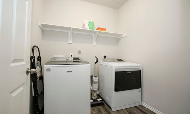 18715 Callalily Bloom Ct, Tomball, TX 77377 - washroom with laundry area, baseboards, independent washer and dryer, and dark wood finished floors