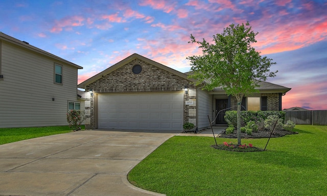 18715 Callalily Bloom Ct, Tomball, TX 77377 - view of front of house featuring brick siding, fence, an attached garage, concrete driveway, and a front yard