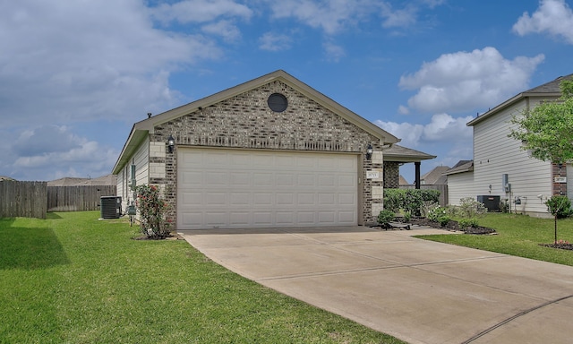 18715 Callalily Bloom Ct, Tomball, TX 77377 - view of front of home featuring central air condition unit, fence, a front lawn, and driveway
