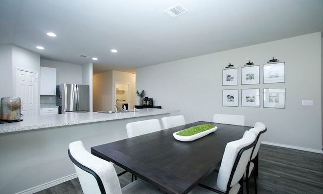 18715 Callalily Bloom Ct, Tomball, TX 77377 - dining area featuring recessed lighting, baseboards, visible vents, and dark wood finished floors