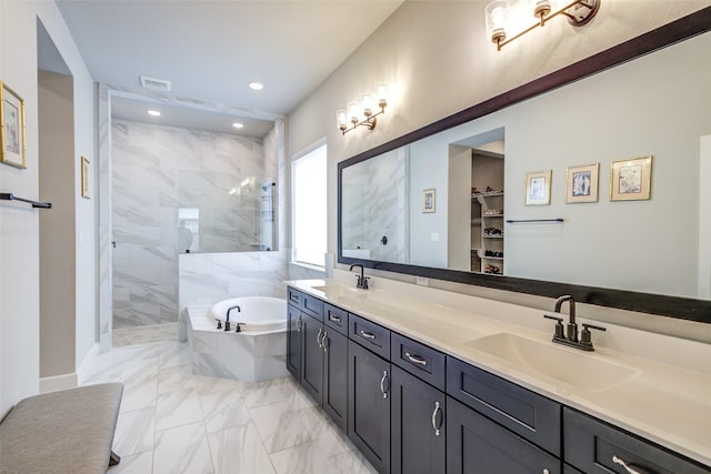 9823 Starry Night Ln, Manvel, TX 77578 - bathroom with a sink, walk in shower, a bath, and marble finish floor