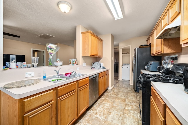 7210 Avocet Ln, Houston, TX 77040 - kitchen featuring a sink, washer / clothes dryer, black gas range oven, dishwasher, and light countertops