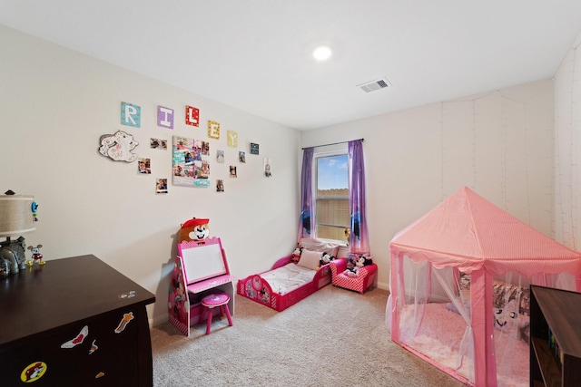 playroom featuring visible vents and carpet floors